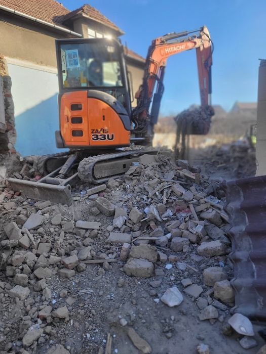 Executam cu buldoexcavator lucrari fundatii fose demolari