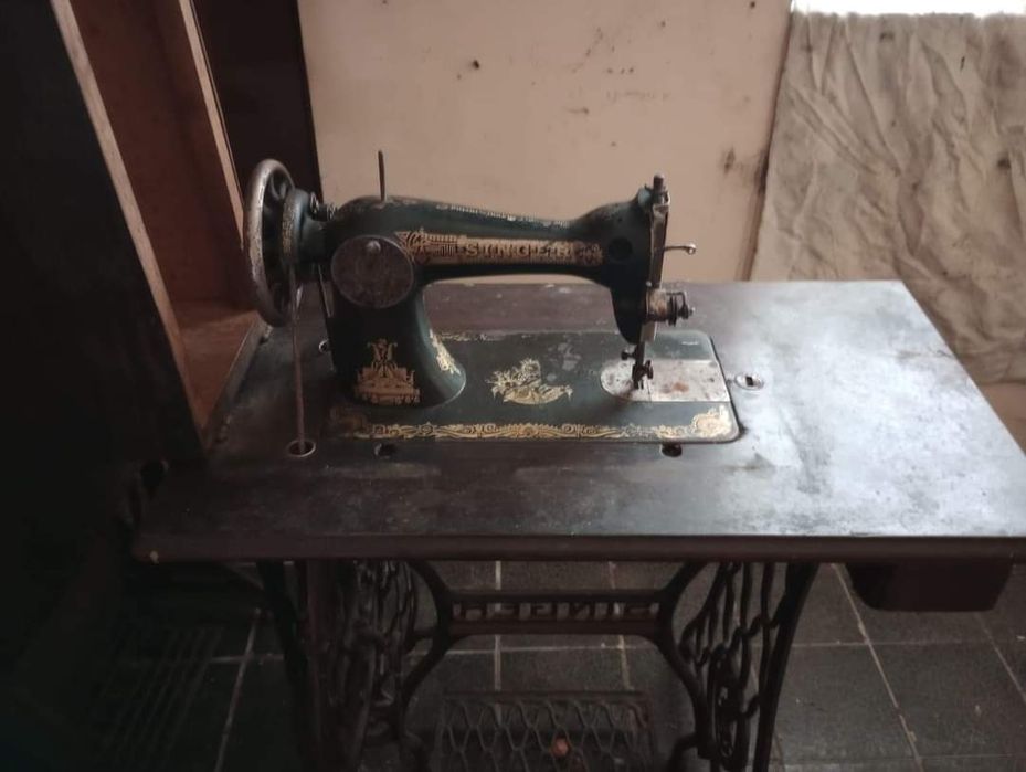 Mașini de cusut Singer