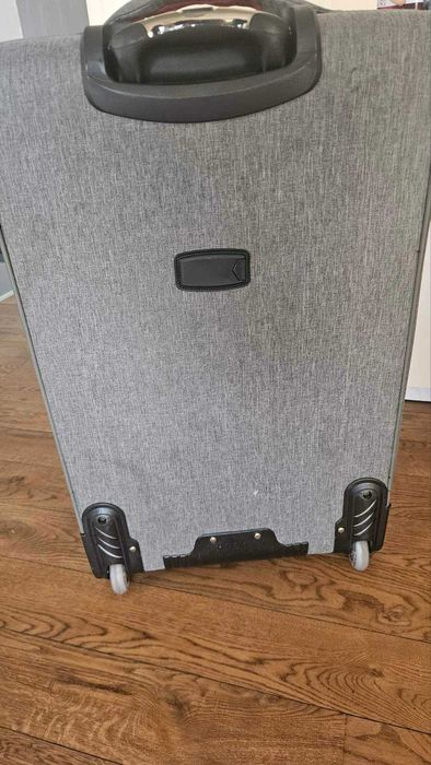 Куфар XXL размер /75/49/25 см,допълнително  разширение,плат с колелца