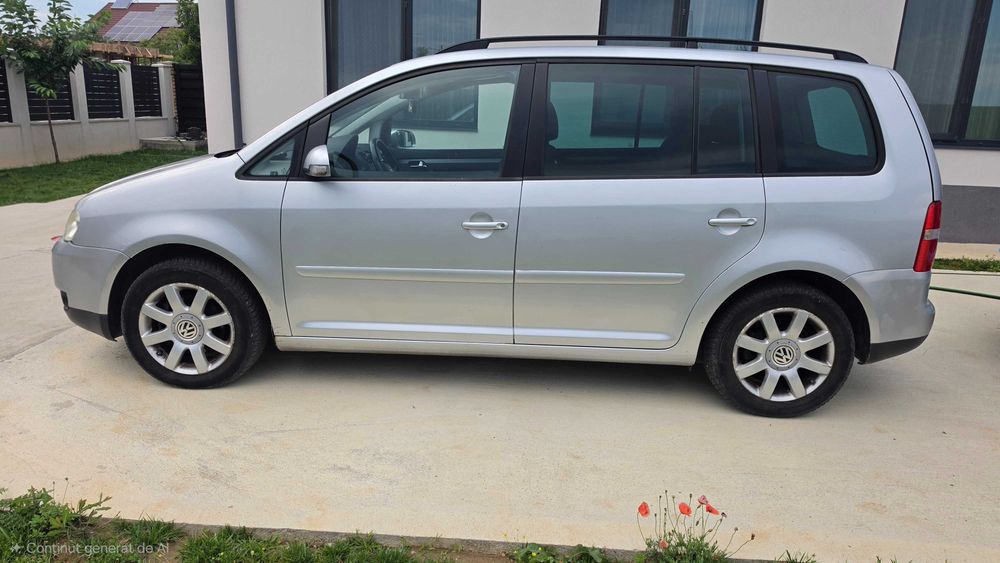 VW Touran 2.0 TDI BKD 140 CP | Unic proprietar | 5 locuri