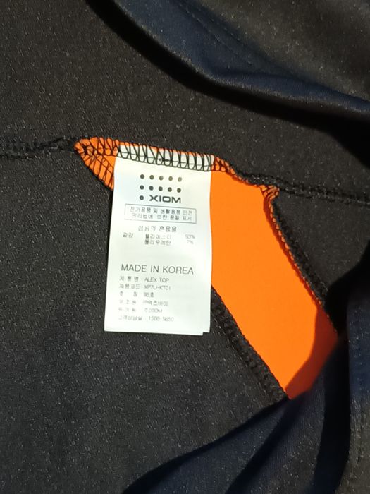 De vânzare Geacă sport XIOM x HANNO, negru cu portocaliu, unisex.