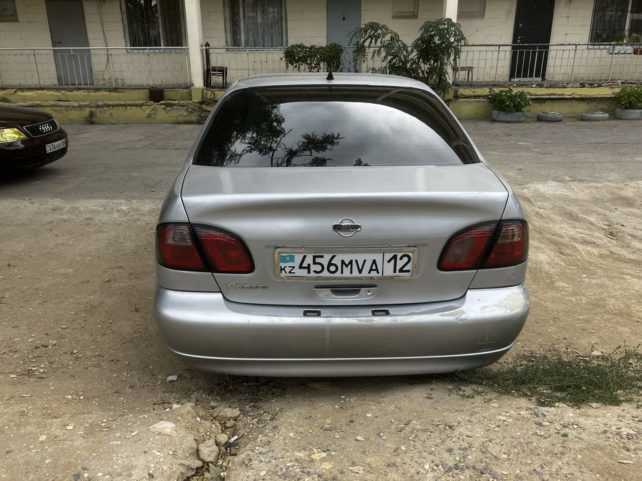 Ниссан примера п11Е