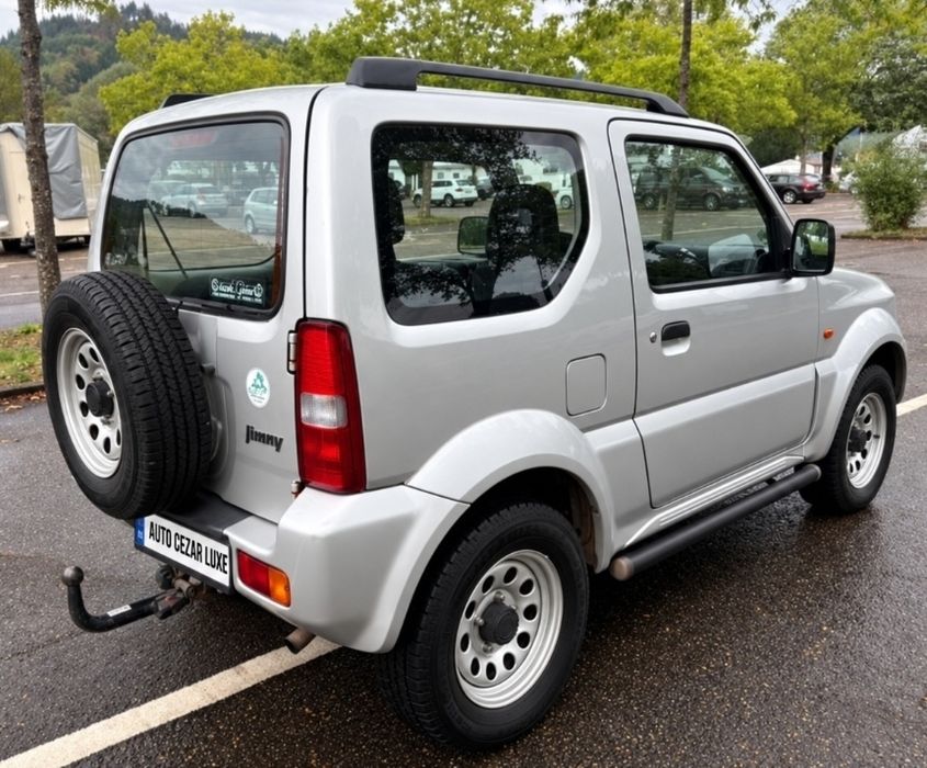 Suzuki JIMNY .1.3  benzina , REDUCTOR, AER CONDITIONAT rate, garantie, livrare la domiciliul clientului