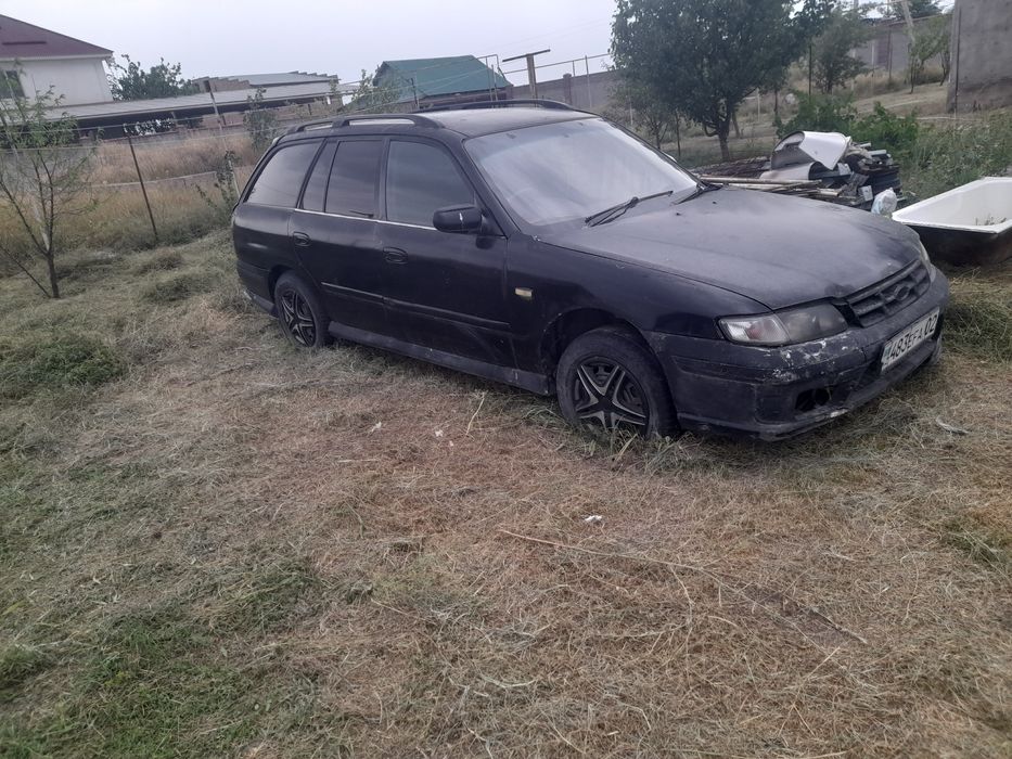 Мазда 626 прави рул
