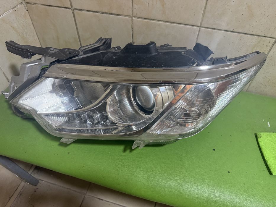 Фара Tayota 55 оригинал левая сторона