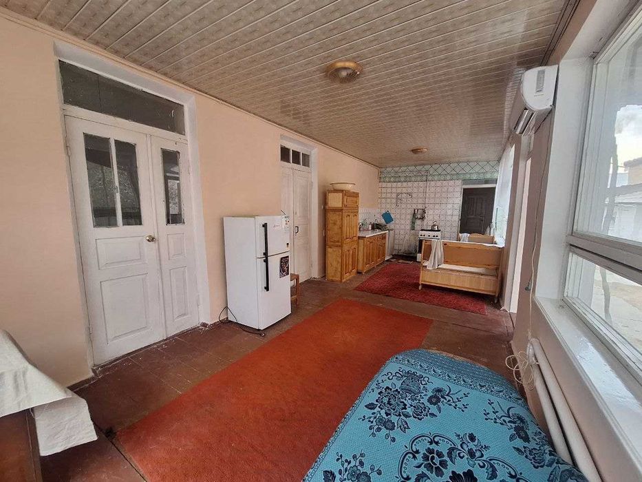 Дом в г. Янгиюле с участком