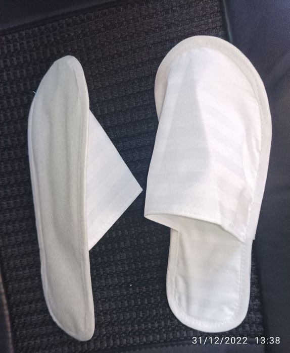 Одноразовые тапочка сотилади