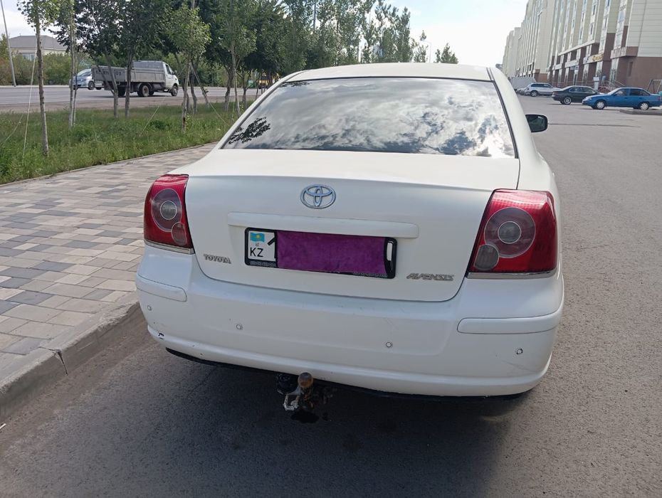 Тойота Авенсис .