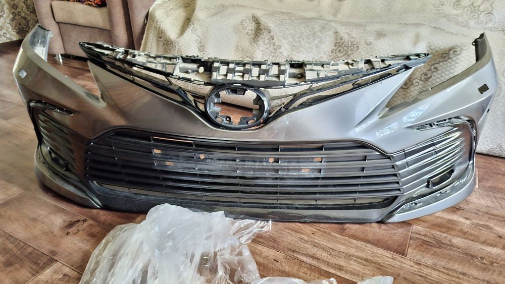 Передний бампер Toyota Camry