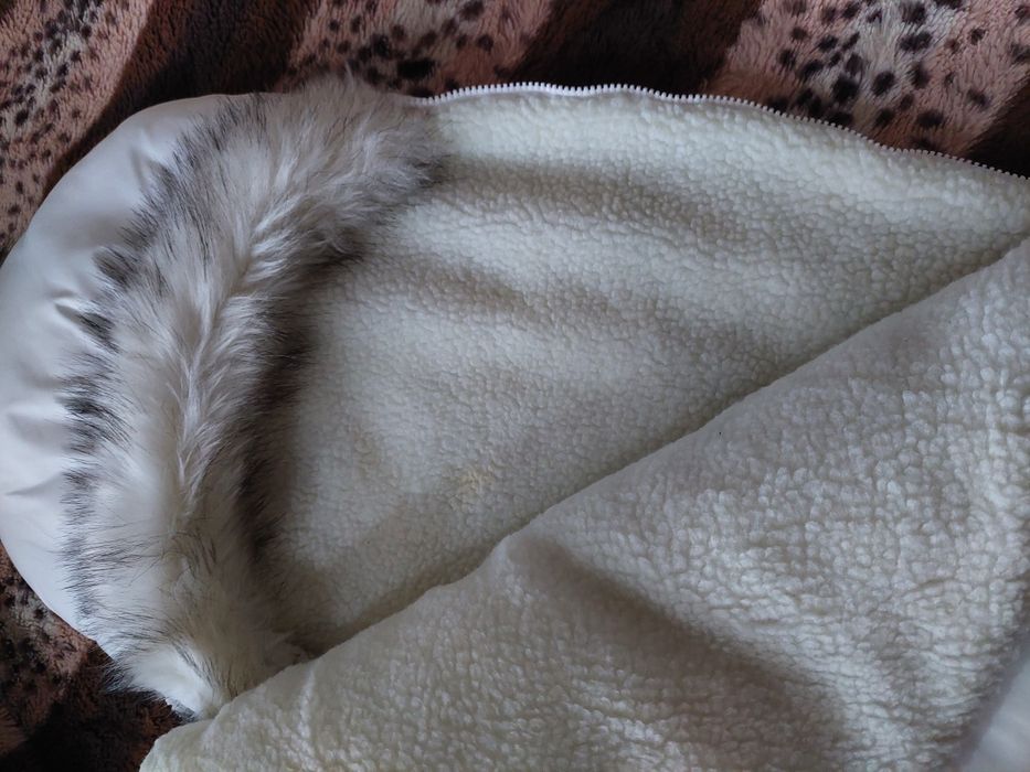 Продам детский конверт и комбинезон