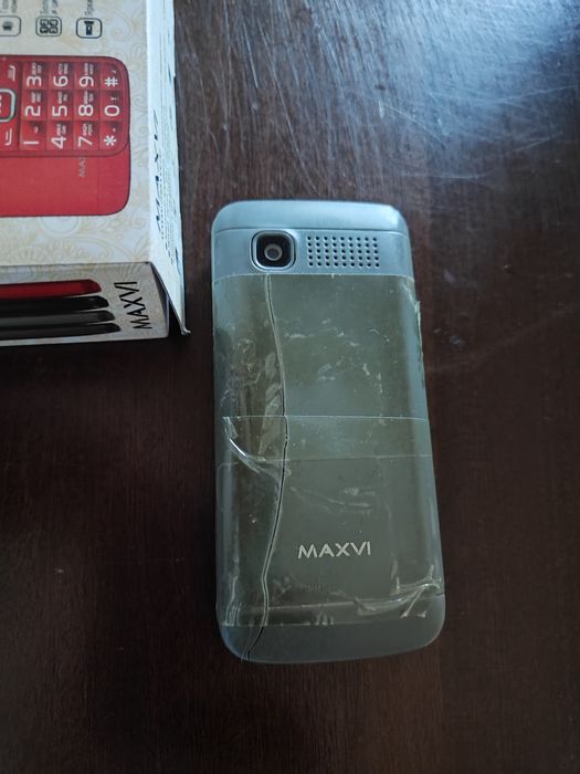 Кнопочный сотовый телефон . Рабочий.