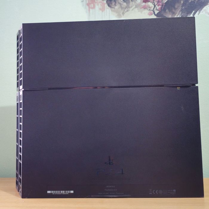 PlayStation 4 Phat + 5 jocuri si manetă