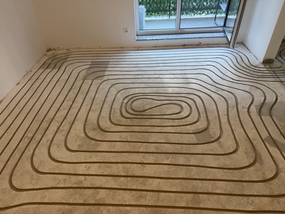 Incalzire in pardoseala prin canelare in sapa existenta