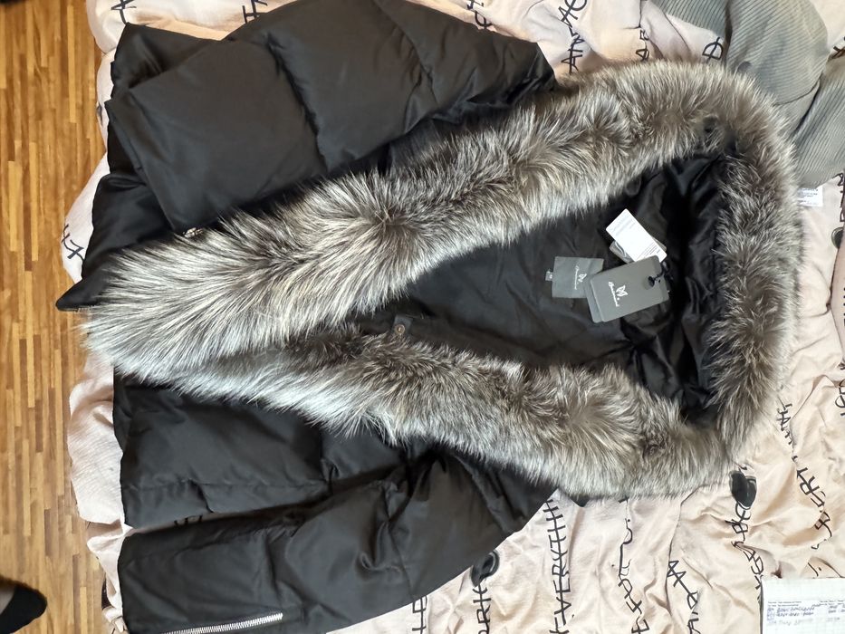 Продам пуховик Новый