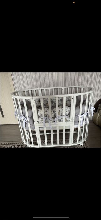 Кроватка 8 в 1 с маятником