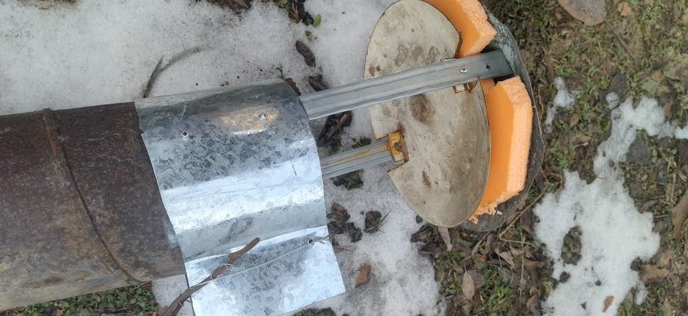 Зонтик дымохода отопления