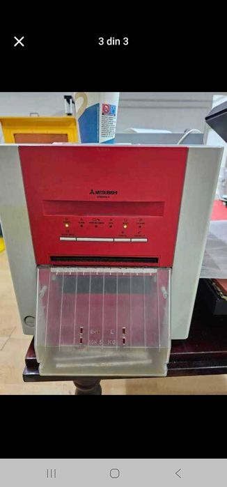 3 imprimante foto mitsubishi si o statie se lucru