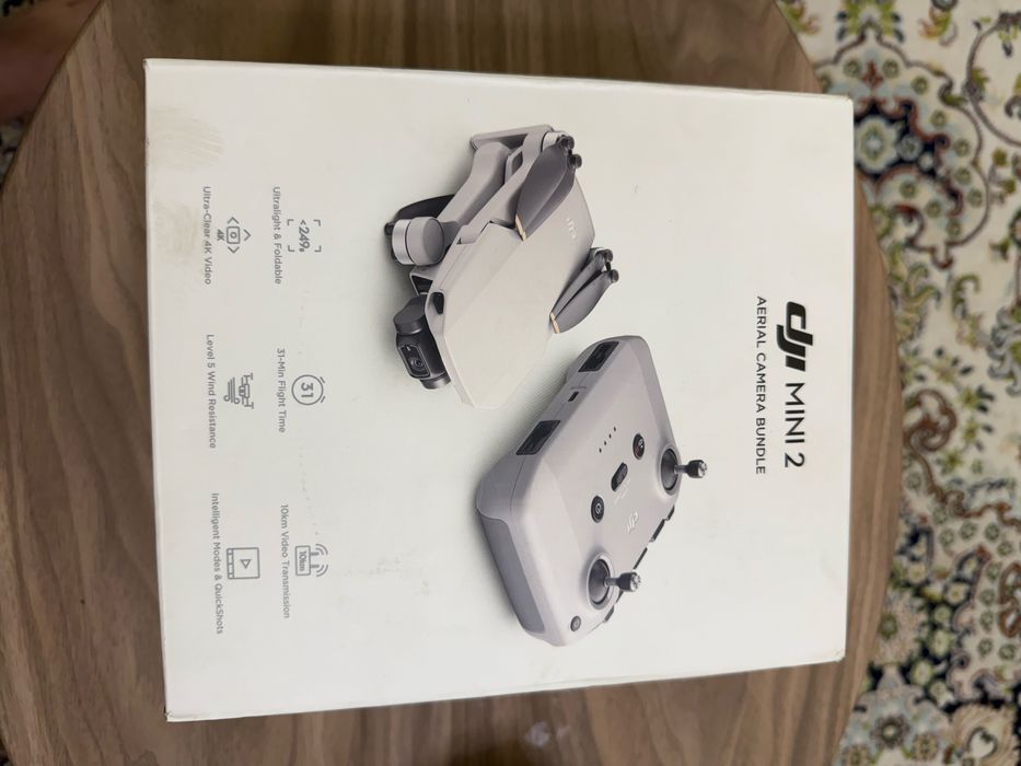 Продается дрон diji mini 2  combo AERIAL CAMERA BUNDLE