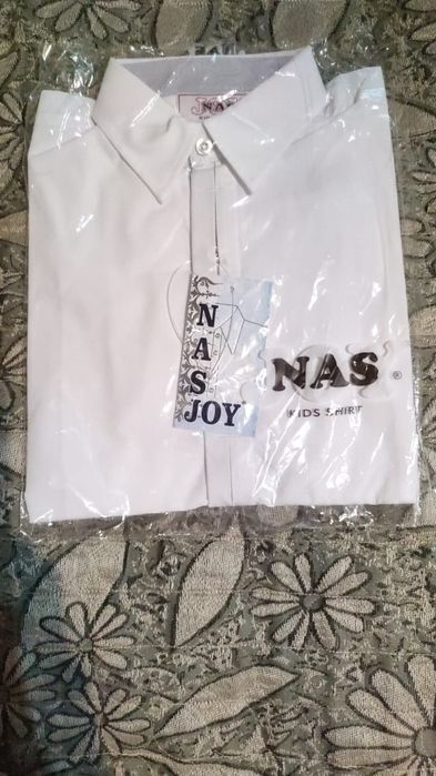 Рубашки новые школьные белые