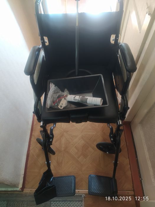 Коляска инвалидная с санитарным оснащением