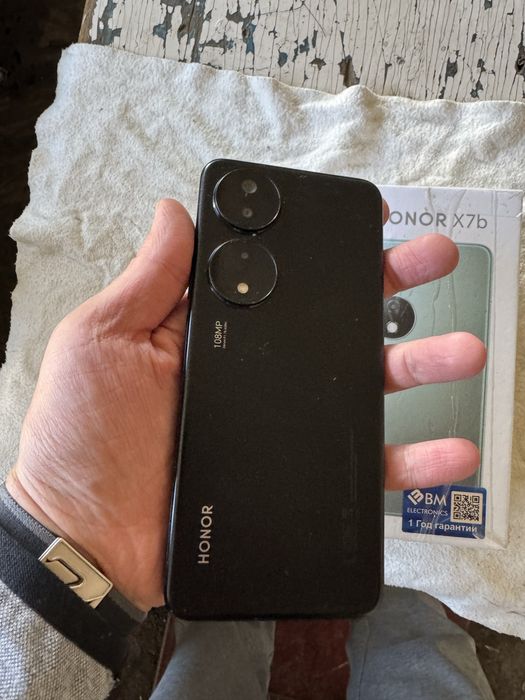 honor x7b pamit 6.256g  holati ideal karopka dak bor