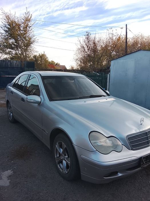 Мерседес Бенц W203