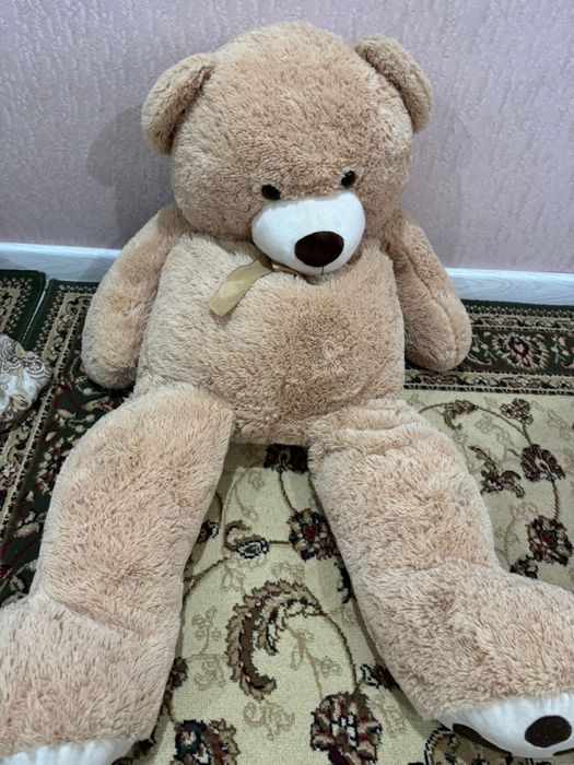Медведь плюшевый