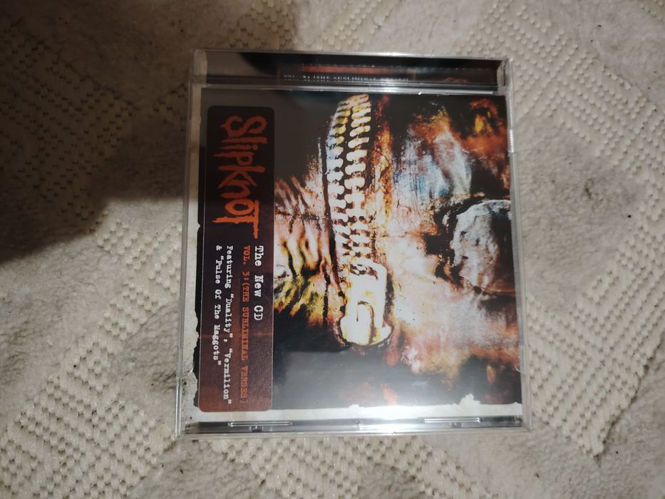 CD slipknot și AC DC