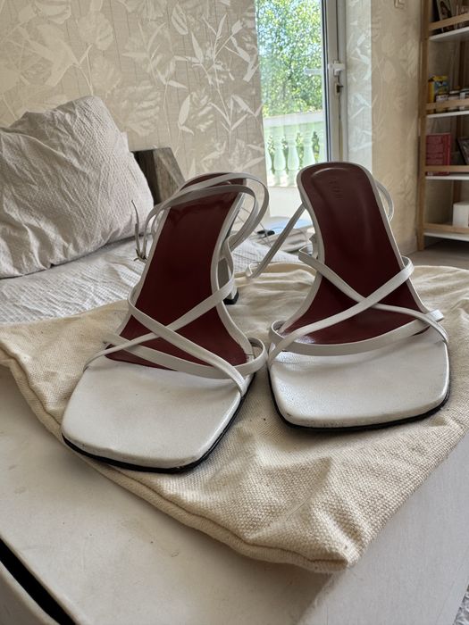 Бели сандали By far