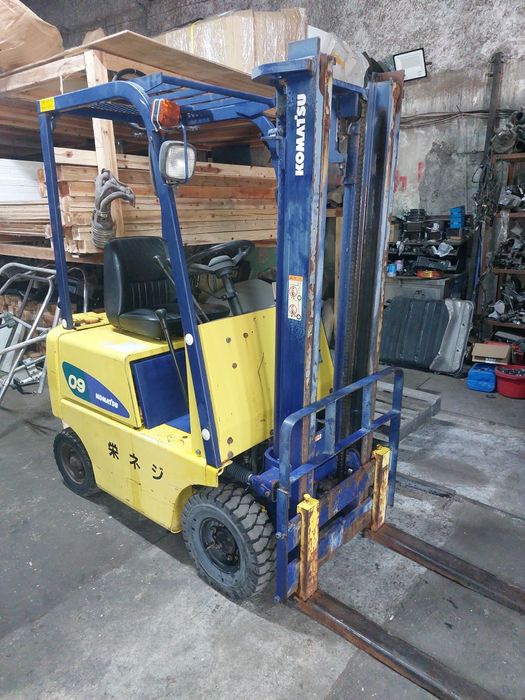 Погрузчик Каматсу 09