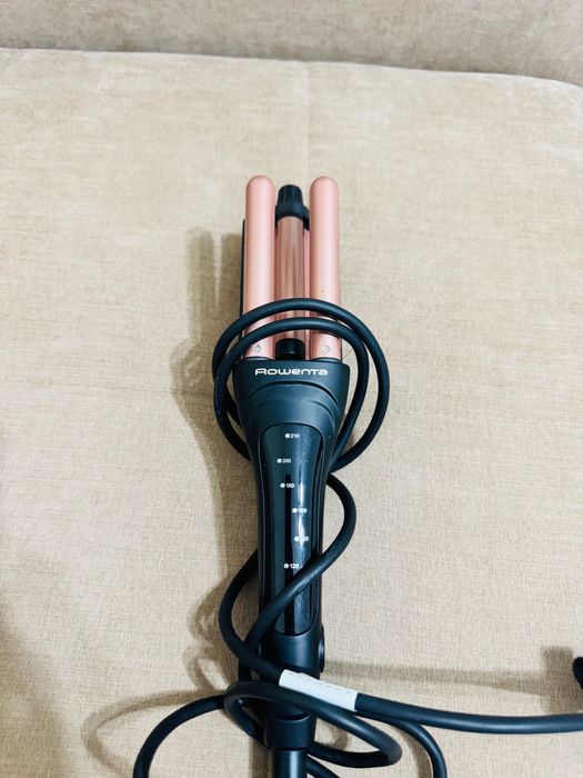 Щипцы для волос Rowenta.