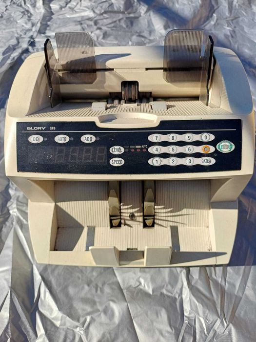 Masina pentru numarat bani Glory
