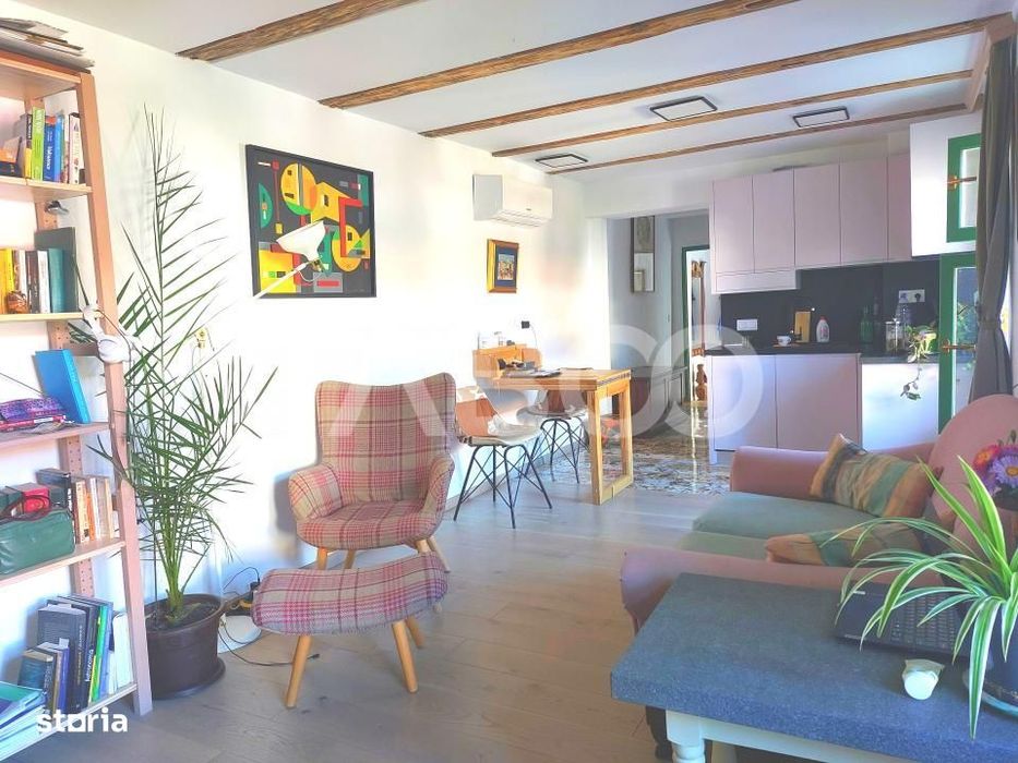 Apartament de vanzare 105 mp 3 camere curte 340 mp in acte Cisnadie