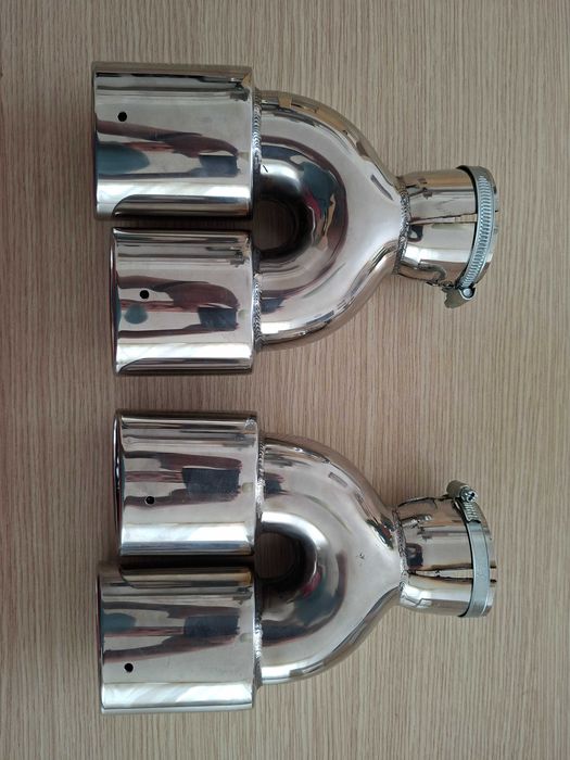 Чифт двойно хромирани накрайници за изход.