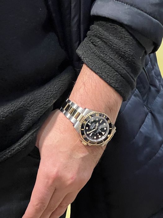 Ролекс субмарин золото