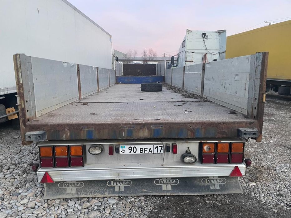 Полуприцеп с бортами Tyllis тяжеловоз