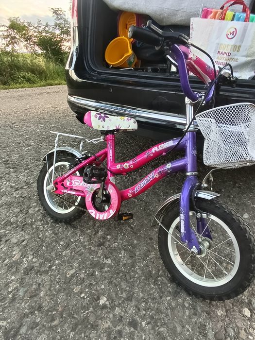 Vând bicicleta Roz