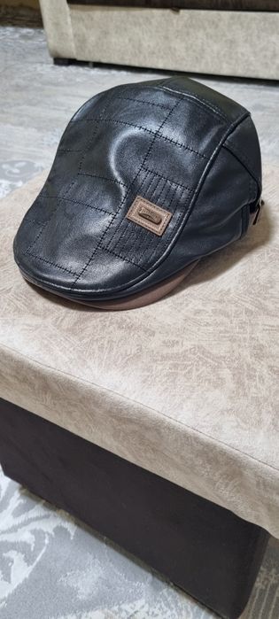 Кепка сотилади. Кожа. 56-58 размер.