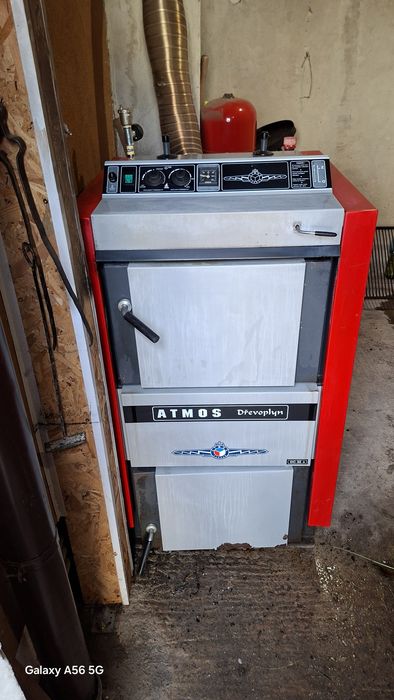 Пиролизен котел на дърва ATMOS DC 32 S (35 kW)