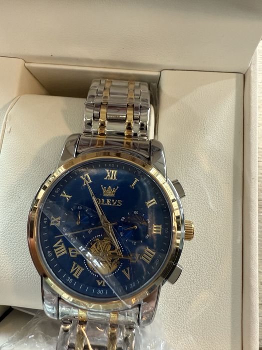 Часовник OLEVS.