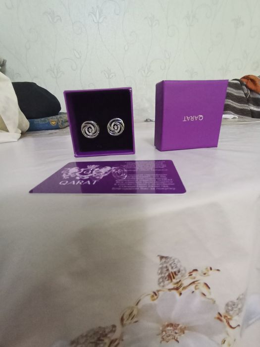 Кумуш зирак бриллиант кузли сертификат билан