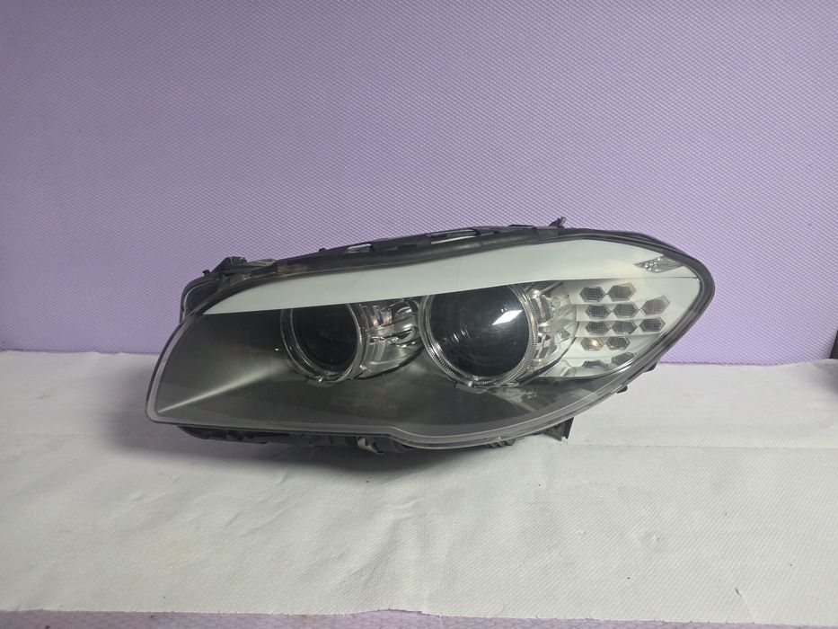 Far stanga BMW Seria 5 F10 F11 Bi-Xenon LED original HELLA 7203245