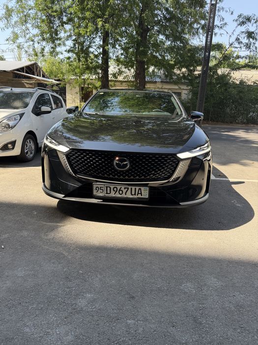 Масса автомобиля Mazda EZ-6