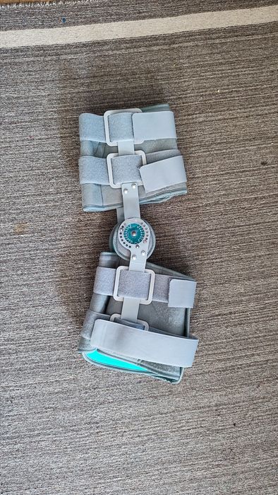 Шина / ортеза за коляно и патерици