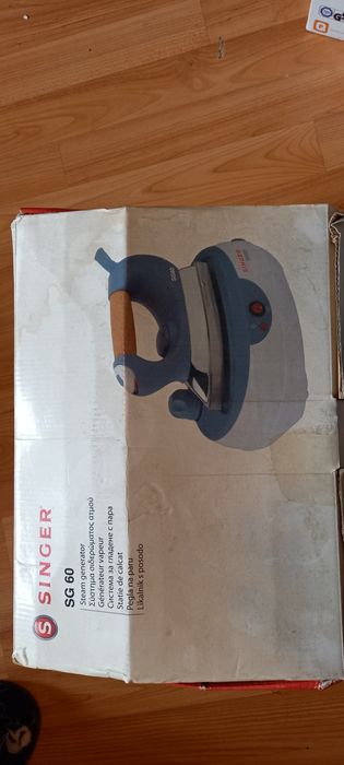 Fier de călcat cu aburi cu rezervor