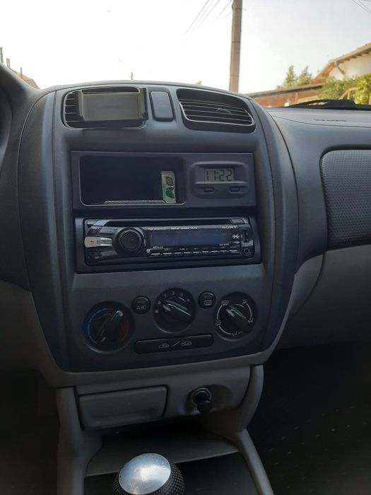 Mazda 323f, бензин 1.3- 72к.с