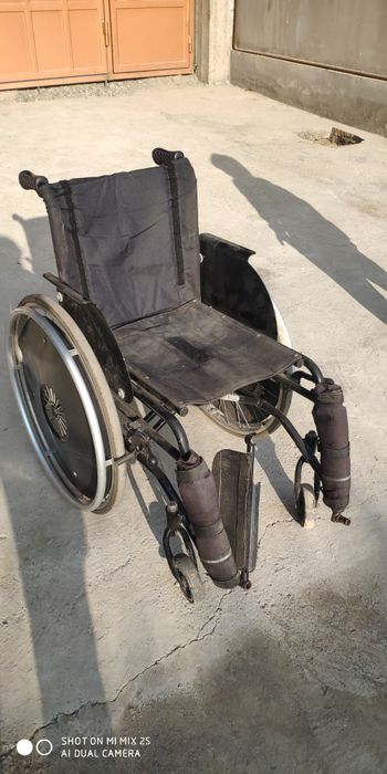 Инвалидная коляска
