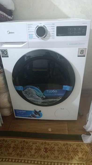 Стипальная машина Midea