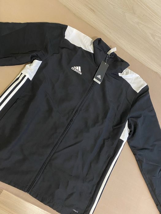 Нова оригинална ветровка Adidas