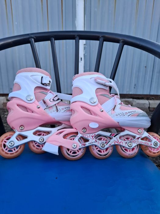 Роликовые коньки